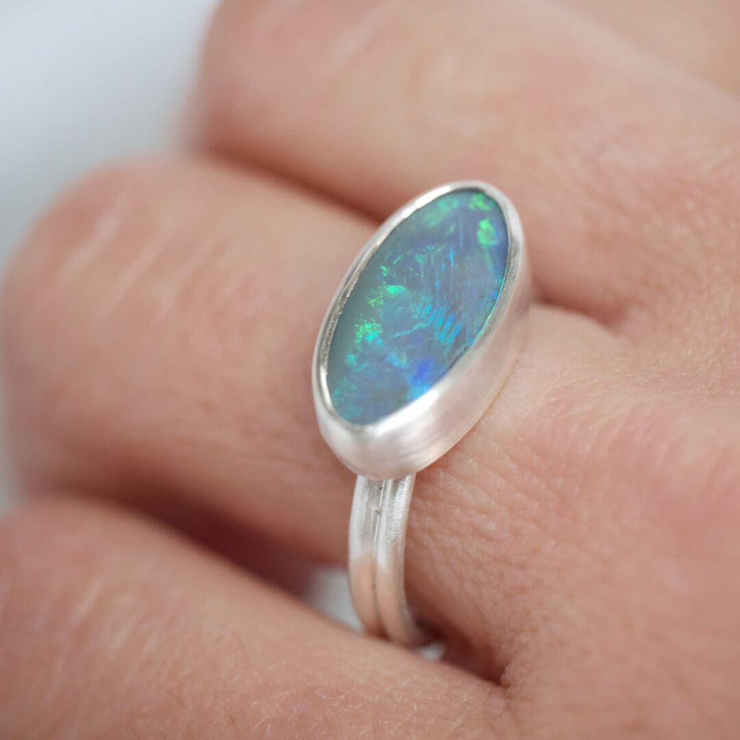 Lightning Ridge Oval Opal dual ring in Argentium Silver, worn