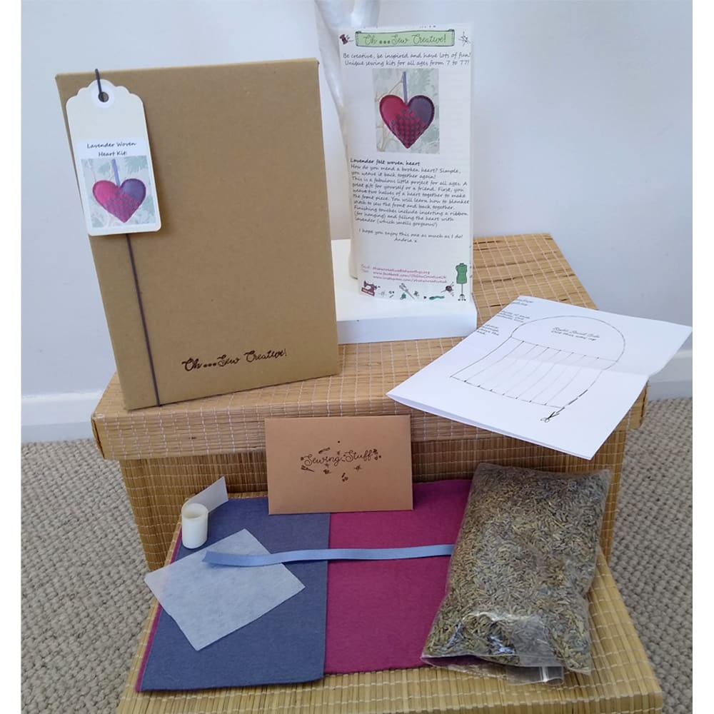 The raspberry and grape lavender woven heart craft kit shows what is inside the box.