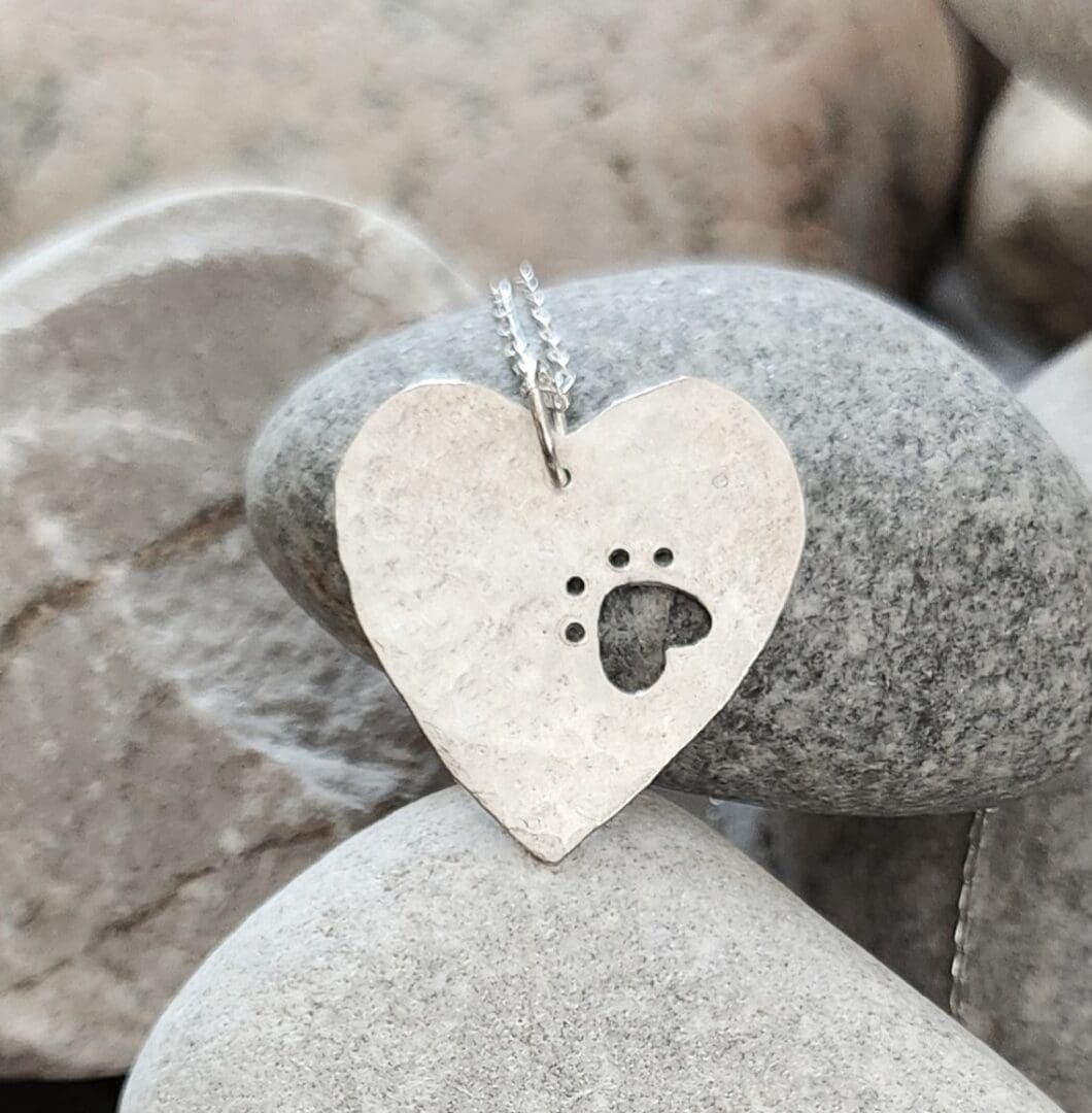 Paw print heart pendant