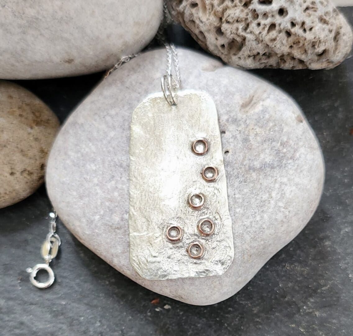 reticulated silver pendant