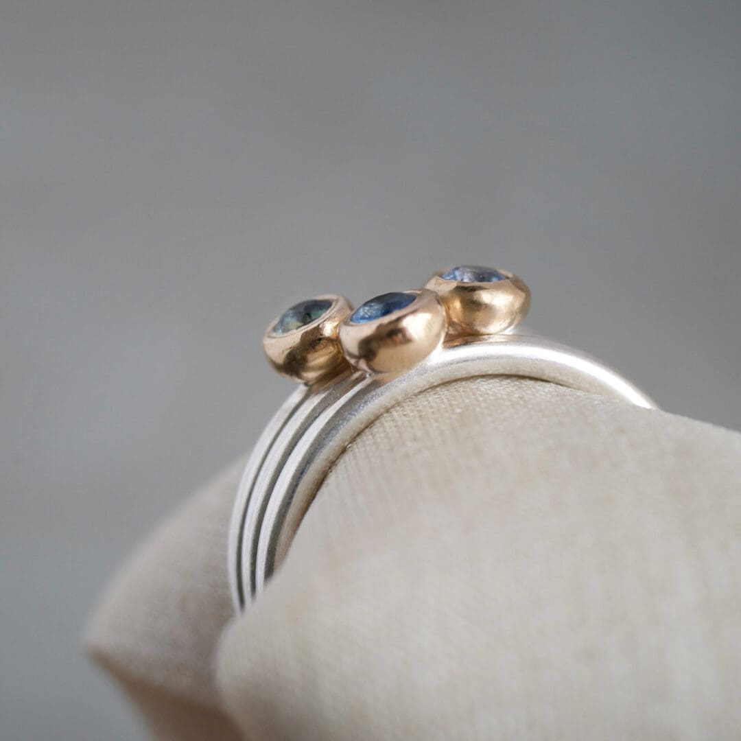 Blue Sapphire stackers, 9ct yellow gold and sterling silver, side view