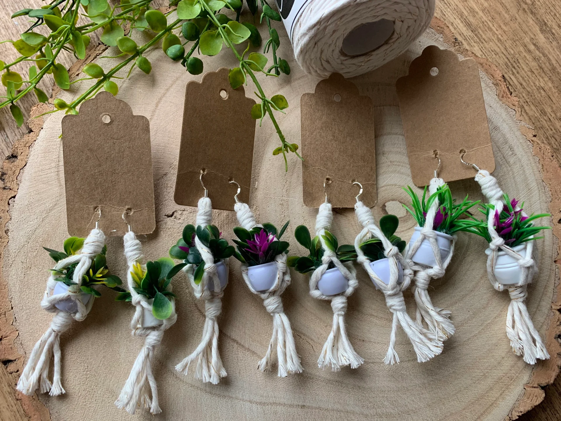 Mini macrame plant hanger earrings made with recycled cotton