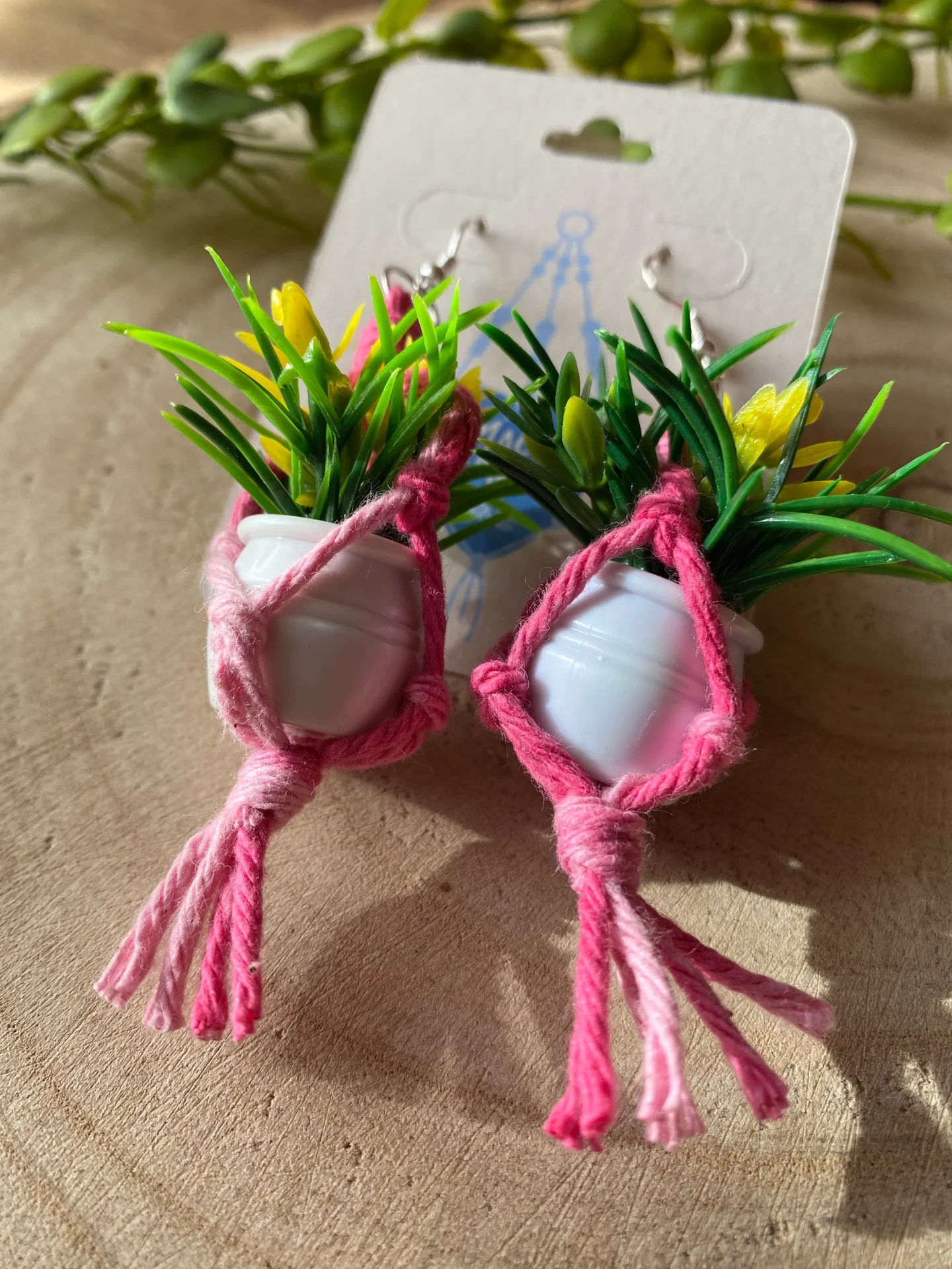 Mini macrame plant hanger earrings made with recycled cotton