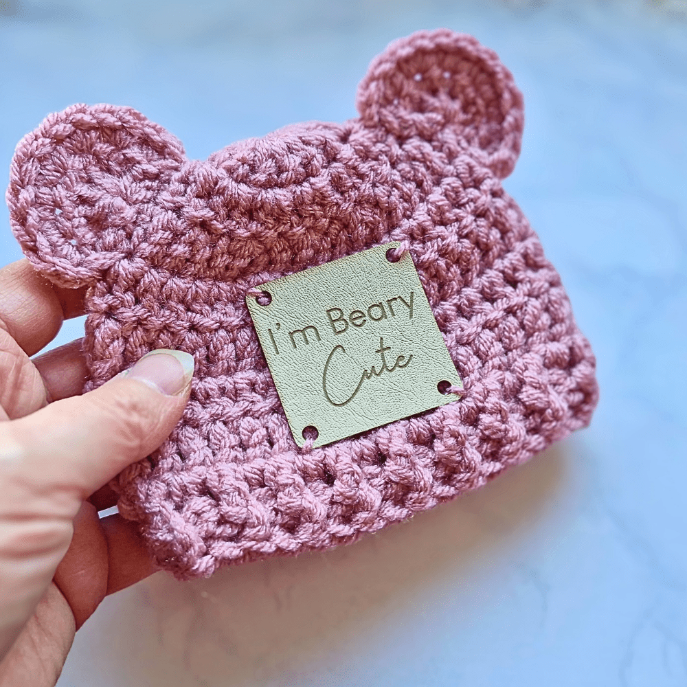 Handmade Crochet bear hat with leather patch, a choice of I'm Beary Cute, pictured in pale rose