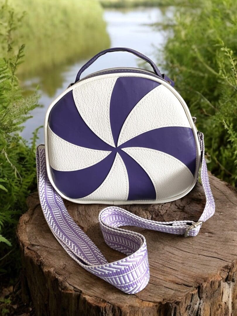 Fun bowler bag front view purple and white swirl pattern