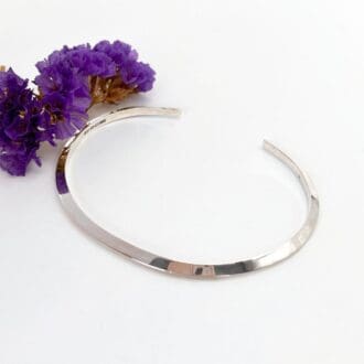 polished hallmarked sterling silver oval cuff bangle. the triangle profile of the silver is really unusual too