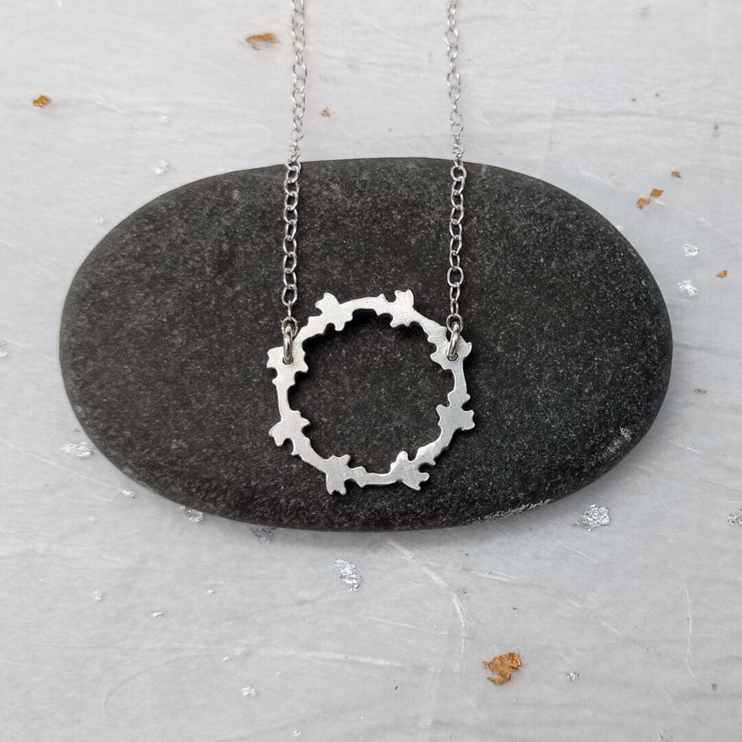 recycled sterling silver handcut patterned circle necklace