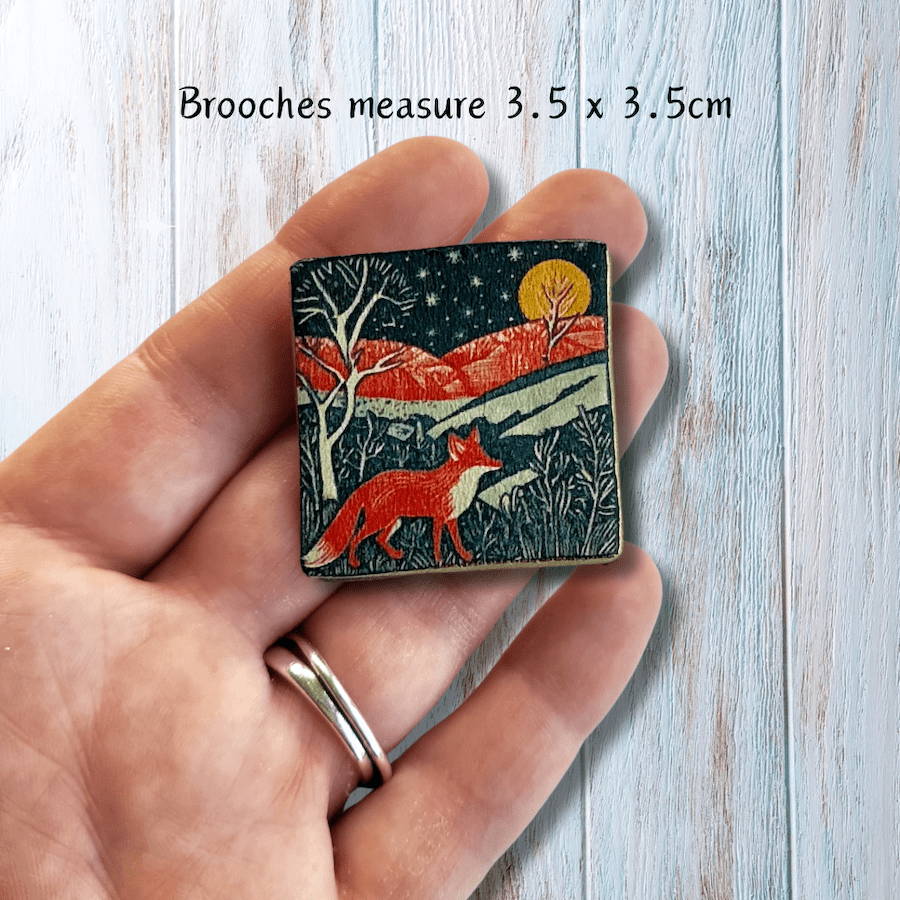 Fox brooch measures 3.5cm square.