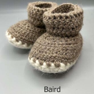 Pair of 100% Scottish Wool Baby soft shoes booties. Presented with a tartan ribbon and box. Handmade in Scotland by Midge Porter Design as part of the 'Peedie Naturals' Clan colours range - Baird