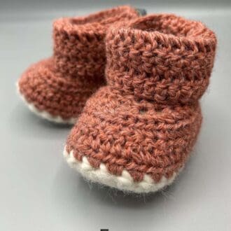 Pair of 100% Scottish Wool Baby soft shoes booties. Presented with a tartan ribbon and box. Handmade in Scotland by Midge Porter Design as part of the 'Peedie Naturals' Clan colours range - Fraser