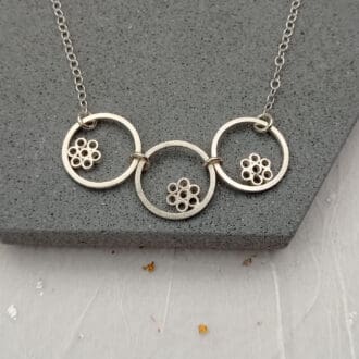 recycled sterling silver three circles necklace with bubble flowers